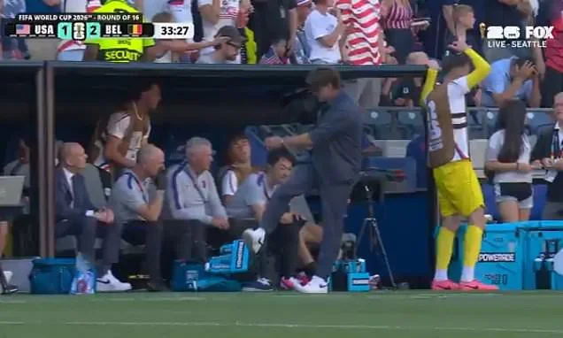 USA boss Mauricio Pochettino suffers World Cup meltdown as he smashes water bottles in fit of rage after watching his team concede to Belgium